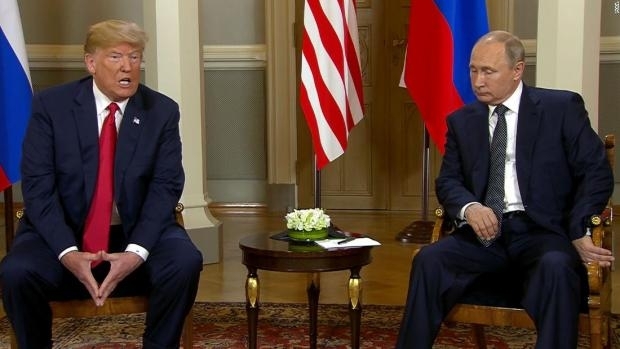 Путін здивував дивним жестом на зустрічі з Трампом Фото № 0 Путін здивував дивним жестом на зустрічі з Трампом Фото № 0
