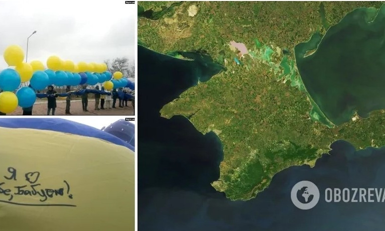 Украинцы приехали на границу с Крымом и запустили флаг с пожеланиями жителям полуострова (ФОТО)