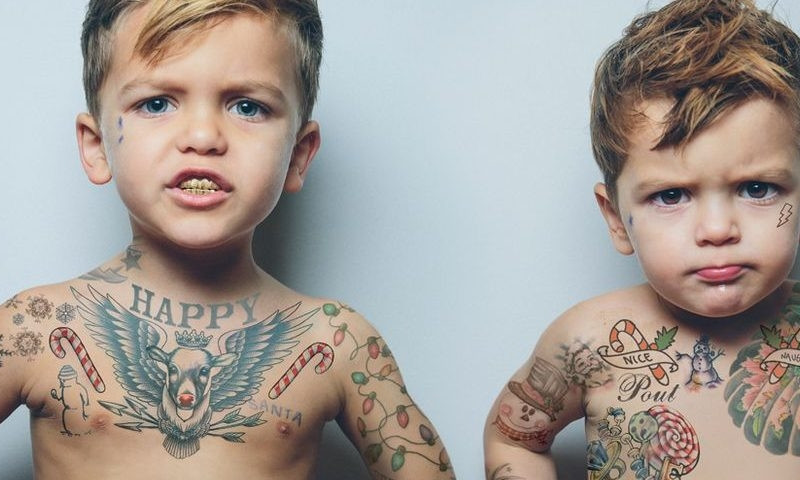 Киевлянин набил 7-летнему сыну тату, экс-супруга посчитала это преступлением